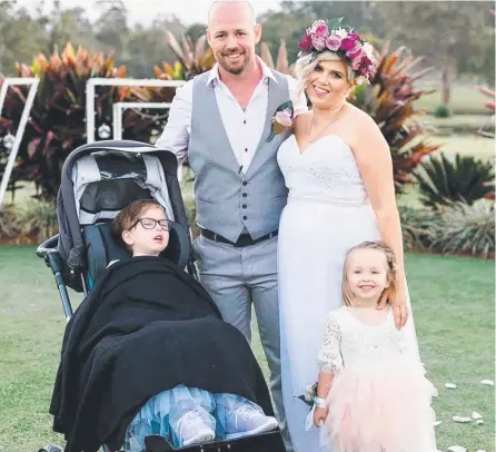  ??  ?? The Skarratts family, Jake and Tania with daughters Paige and Imogen, at the commitment ceremony.