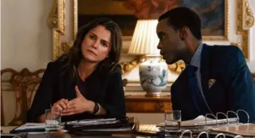  ?? NETFLIX VIA AP ?? Keri Russell and Ato Essandoh in “The Diplomat,” which was renewed this week.