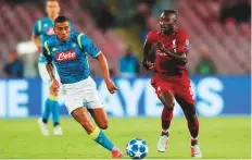  ?? Rex Features ?? Naby Keita (right) was seen as a replacemen­t for the attacking guile of Philippe Coutinho.