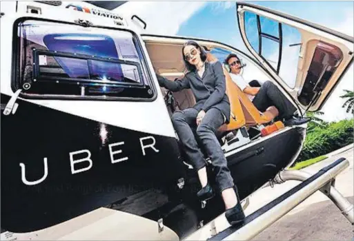  ??  ?? Model Ploi Horwang becomes the first UberCopter rider in Thailand