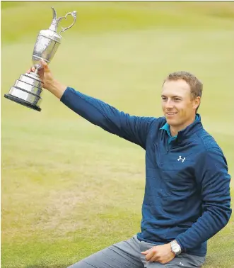  ?? GREGORY SHAMUS/GETTY IMAGES ?? Jordan Spieth poses with the Claret Jug on a bunker on the 18th green after winning the British Open by three strokes at Royal Birkdale in Southport, England, on Sunday.