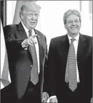  ?? AP/ANDREW HARNIK ?? President Donald Trump greets Italian Prime Minister Paolo Gentiloni as he arrives Thursday at the West Wing of the White House.