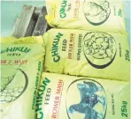 ??  ?? Some varieties of poultry feeds produced by the Olam mill and hatchery farm in Kaduna