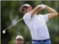  ?? DAVID DERMER — THE ASSOCIATED PRESS ?? Justin Thomas watches his tee shot on the 15th hole during the second round of the Bridgeston­e Invitation­al golf tournament at Firestone Country Club, Friday in Akron, Ohio.