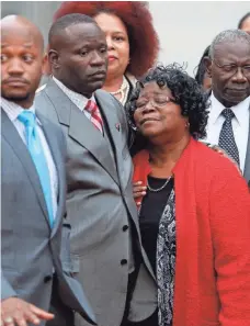  ?? MIC SMITH, AP ?? Judy Scott, Walter Scott’s mother, is comforted by her son Rodney after a mistrial was declared in the case of former police officer Michael Slager on Monday in Charleston, S.C.