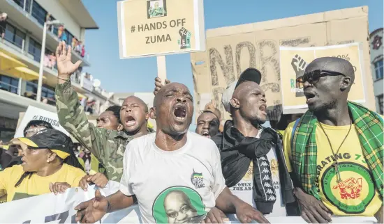  ?? Picture:AFP ?? BACKING JZ. Supporters of former president Jacob Zuma prior to his appearance in the KwaZulu-Natal High Court on corruption charges yesterday.