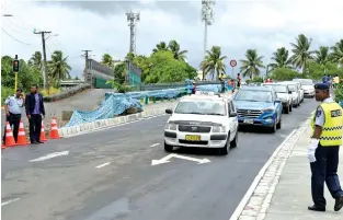  ?? Photo: Vilimoni Vaganalau ?? Traffic moves along the newly-constructe­d Vatuwaqa Bridge after the official opening on January 11, 2018.