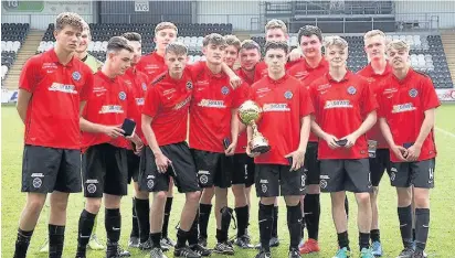  ??  ?? Champions The Glenvale under-19s show off their trophy