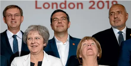  ?? GETTY IMAGES ?? Slovenia’s Prime Minister Miro Cerar, Britain’s Prime Minister Theresa May, Greece’s Prime Minister Alexis Tsipras, Germany’s Chancellor Angela Merkel and Bulgaria’s Prime Minister Boyko Borissov prepare to take part in the family photo during the...