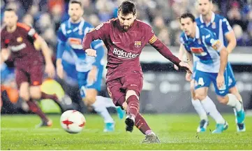  ??  ?? Lionel Messi shoots a penalty kick and missed during the Spanish Copa del Rey quarter-final first leg match against RCD Espanyol at the RCDE Stadium in Cornella de Llobregat. — AFP photo