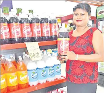  ?? Picture: SUPPLIED ?? Sangeeta Roy of Cunningham Stage 4 with a bottle of Sprint at Food City.