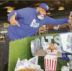  ?? Leeanne Griffin / Hearst Connecticu­t Media ?? Daymon “Daym Drops” Patterson, a celebrity YouTube food critic, is launching Daym Drops Diner at Dunkin’ Donuts Park this season.