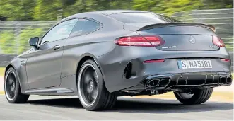  ??  ?? SPOILER ALERT: C63’s rear view would look bare without a carbon-fibre lip spoiler