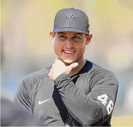  ?? David J. Phillip/Associated Press ?? New York Yankees’ Anthony Rizzo waits for the start of fielding drills during a spring training workout on Feb. 20 in Tampa, Fla.