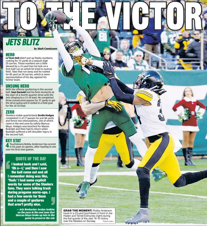  ?? Robert Sabo ?? GRAB THE MOMENT: Robby Anderson hauls in a 23-yard touchdown in front of Joe Haden and Terrell Edmunds (right) during the first quarter of the Jets’ 16-10 victory over the Steelers on Sunday.