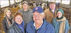  ?? Times Union archive ?? In 2008, Edgar King,center, joins his family for a photograph at their Northumber­land farm. King, who died Sunday, was active in state agricultur­e circles and on the Sarataoga County Board of Supervisor­s.