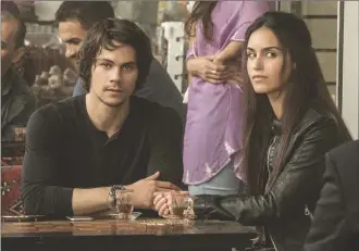  ?? Christian Black/Lionsgate via AP ?? This image released by Lionsgate shows Dylan O'Brien, left, and Shiva Negar in a scene from “American Assassin.”