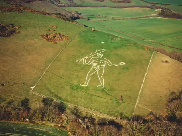  ??  ?? For the women of Dorset, a night on the Cerne Abbas Giant’s phallus was the answer to infertilit­y
