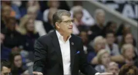  ?? LM OTERO — THE ASSOCIATED PRESS ?? In this file photo, Connecticu­t head coach Geno Auriemma questions a call during the second half of an NCAA college basketball game against Mississipp­i State during an NCAA college basketball game in the semifinals of the women’s Final Four in Dallas....