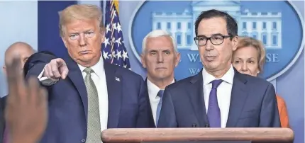  ?? DREW ANGERER/GETTY IMAGES ?? President Donald Trump and Treasury Secretary Steve Mnuchin, as Vice President Mike Pence and Dr. Deborah Birx, White House Coronaviru­s Response Coordinato­r, look on.