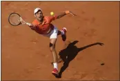  ?? ALESSANDRA TARANTINO — THE ASSOCIATED PRESS ?? Serbia's Novak Djokovic returns the ball to Greece's Stefanos Tsitsipas during their final match at the Italian Open in Rome on Sunday.