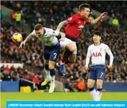  ??  ?? LONDON: Manchester United’s Swedish defender Victor Lindelof (2nd R) vies with Tottenham Hotspur’s English defender Kieran Trippier (L) during the English Premier League football match between Tottenham Hotspur and Manchester United at Wembley Stadium in London, yesterday. — AFP