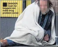  ??  ?? DANGER: Cash for beggars can make drug problem worse