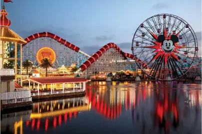  ?? Jay L. Clendenin/ Los Angeles Times/
TNS ?? ABOVEPixar Pier at Disney California Adventure Park in Anaheim,Calif.