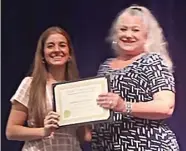  ?? Submitted photo ?? Ginger Serpas, right, Crystal Chimes Chorus’ scholarshi­p chair, presents Annabel L. Robertson with a certificat­e representi­ng her scholarshi­p.