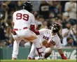  ?? MICHAEL DWYER - THE ASSOCIATED PRESS ?? Boston Red Sox’s Enrique Hernandez celebrates with Alex Verdugo (99) after scoring on a single by Rafael Devers during the fifth inning of the team’s baseball game against the Minnesota Twins, Thursday, Aug. 26, 2021, in Boston.