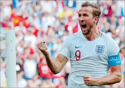  ?? ANTONIO CALANNI/AP PHOTO ?? England’s Harry Kane celebrates after he scored his side’s second goal during the group G match against Panama at the World Cup on Sunday at Nizhny Novgorod, Russia. Kane scored three goals as England won 6-1.
