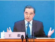  ??  ?? Wang Yi durante conferenci­a de prensa virtual.