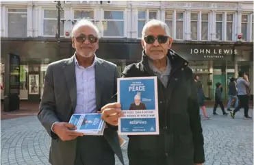  ?? Picture: Dijana Capan / DVision ?? HOPE FOR PEACE: Members of the Ahmadiyya Muslim Community UK held a stall in Reading town centre on Saturday as part of its national Stop World War Three campaign
