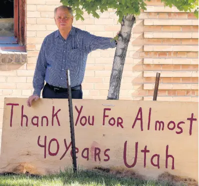  ?? AP ?? Euro Treasures Antiques owner Scott Evans poses next to a ‘Thank You’ sign before Friday, May 8, 2020, in Salt Lake City, Utah. Evans is closing his art and antique store after 40 years. With a drastic drop in customers due to COVID-19 concerns and shelter-in-place orders, Evans says it was no longer cost effective to stay open.