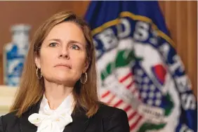  ?? MANUEL BALCE CENETA/ASSOCIATED PRESS ?? Supreme Court nominee Judge Amy Coney Barrett listens during a meeting Oct. 1 with Sen. Jerry Moran, R-Kan., on Capitol Hill in Washington.