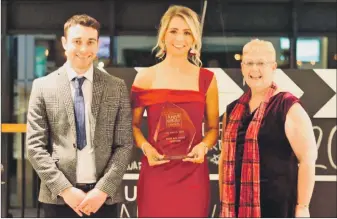  ??  ?? Stephanie Mitchell, centre, with Neil Boyle and Anne Paterson, who presented the award.