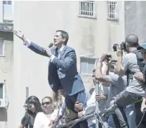  ??  ?? Juan Guaido speaks during a rally to press the military to let in US humanitari­an aid in eastern Caracas. — AFP