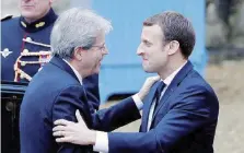  ?? LaPresse ?? Alleati Paolo Gentiloni ed Emmanuel Macron