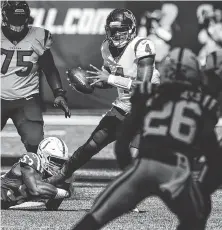  ?? Brett Coomer / Staff photograph­er ?? Texans quarterbac­k Deshaun Watson suffers one of seven sacks by the Colts on Sunday.