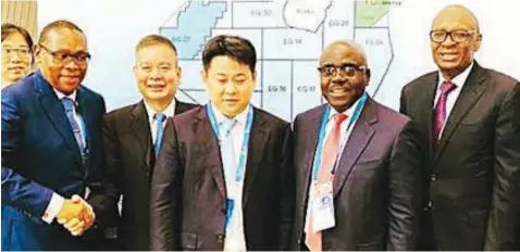  ??  ?? Chief Executive Officer Waltersmit­h Petroman Oil Ltd, Chikezie Nwosu (left); an official of HAWTAI Energy Limited, Jason Zhang; President of HAWTAI Energy (HK) Limited, Mr. Cai Xianhe; Chairman, Waltersmit­h Petroman Oil Ltd, Mr. Abdulrazaq Isa; and Executive Vice Chairman, Waltersmit­h Petroman Oil Ltd, Mr Danjuma Saleh during the acquisitio­n bid ceremony for oil block EG-23 in Equitorial Guinea, recently.