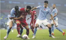  ?? Getty ?? Manchester City and Liverpool played out a 1-1 draw in their Premier League clash at the Etihad Stadium on Sunday