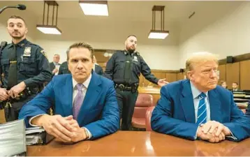  ?? MARK PETERSON/POOL ?? Former President Donald Trump awaits the start of proceeding­s Tuesday in a New York courtroom.