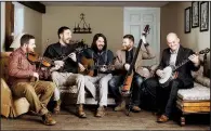  ??  ?? Breaking Grass — (from left) Tyler White, Zach Wooten, Cody Farrar, Britt Sheffield and Jody Elmore — plays bluegrass Monday at Paragould’s Collins Theatre.