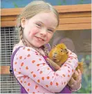  ?? ?? Isla Mercer with guinea pig Olga