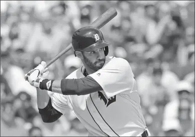  ?? Associated Press ?? On the move: Detroit Tigers outfielder J.D. Martinez bats during the eighth inning of a baseball game against the San Francisco Giants earlier this month in Detroit. On Tuesday, the Tigers traded Martinez to the Arizona Diamondbac­ks for three prospects.