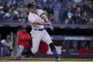  ?? Photograph: Frank Franklin II/ AP ?? The Yankees’ Giancarlo Stanton connects for a three-run home run in the first inning of Tuesday’s game against the Cleveland Guardians.