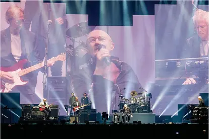  ?? ?? Pictures: GETTY
TURN IT ON AGAIN: Genesis in Glasgow last month during their Last Domino Tour. Below, a spider’s web