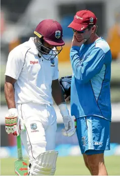  ?? PHOTOSPORT ?? West Indies batsman Sunil Ambris retires hurt after being hit on the arm and suffering a break, on the fourth day of the second test against New Zealand yesterday.