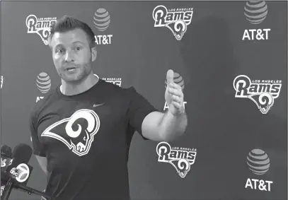  ??  ?? NEW COACH IN TOWN: Los Angeles Rams coach Sean McVay gestures while making a point after the first official day of his new team’s offseason football program Monday in Thousand Oaks, Calif.