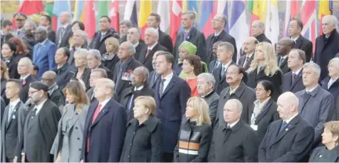  ?? — AFP ?? World leaders attend a ceremony at the Arc de Triomphe in Paris on Sunday.